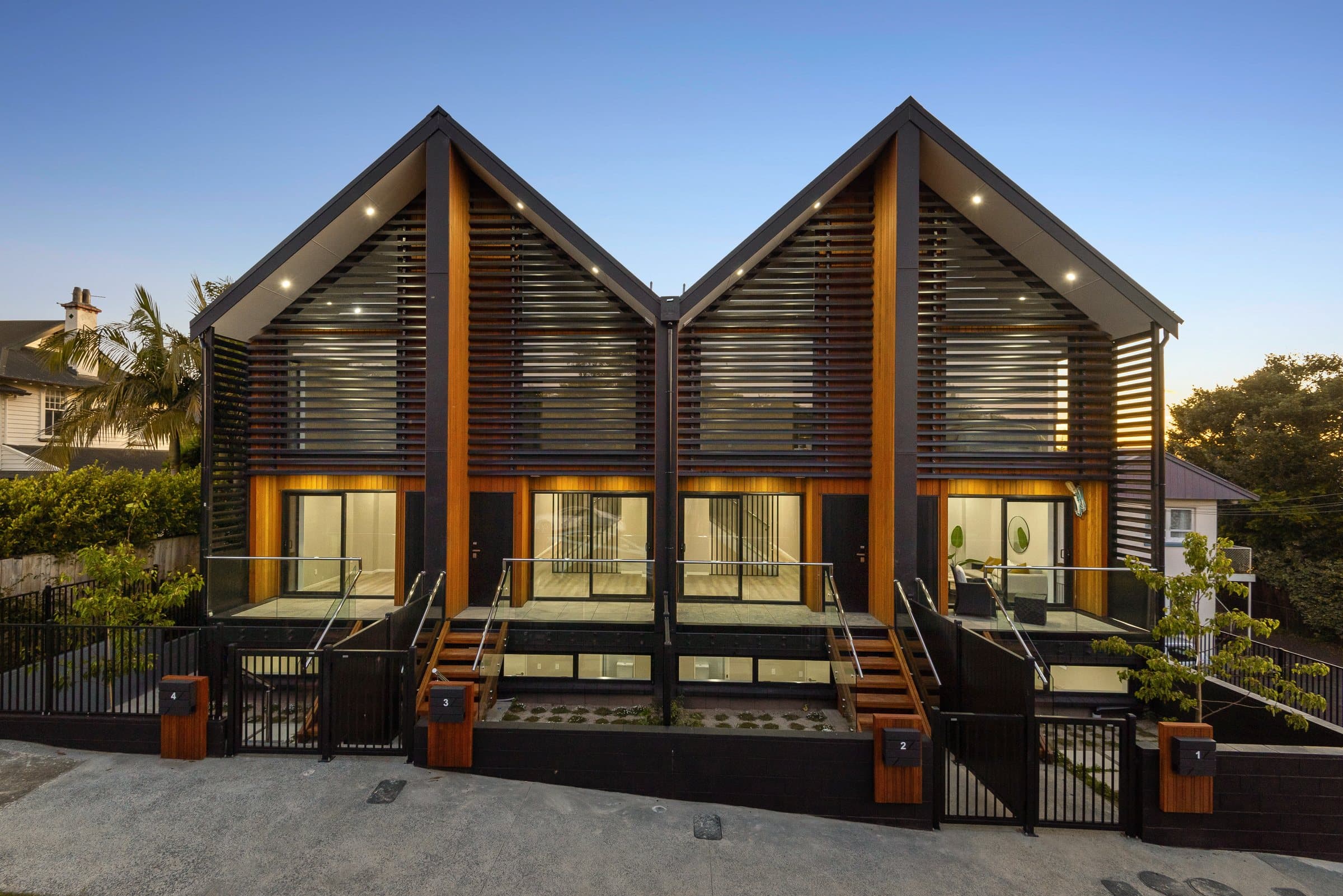 Architectural timber-clad homes at 20 Fairview Road, Mount Eden
